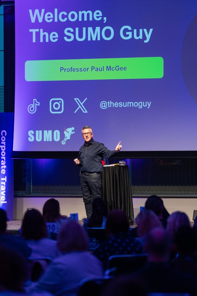 Paul McGee delivering a keynote at the Corporate Travel Summit